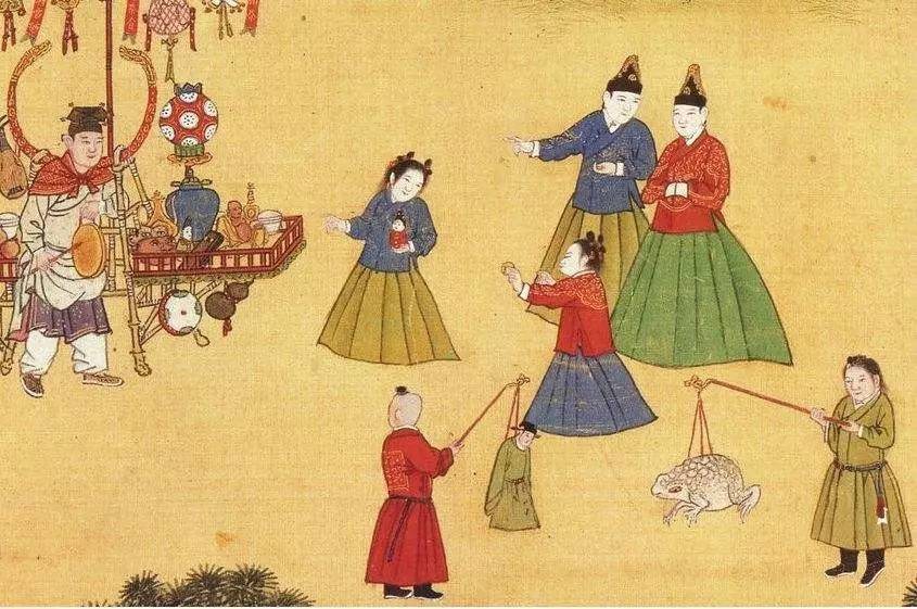 明宪宗元宵行乐图人物的上衣下裳两截穿衣.jpg
